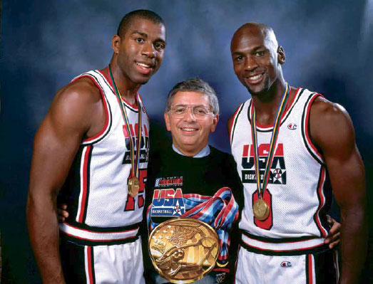 David Stern between two Team USA players wearing Olympic gold medals
